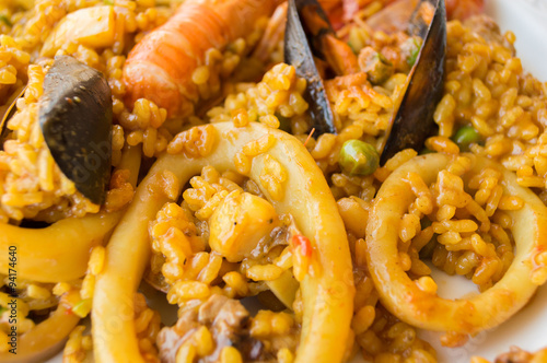 tasty spanish paella with rice and seafood