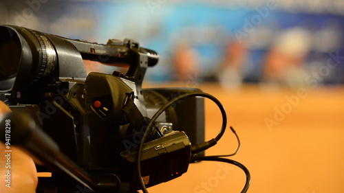 The camcorder while reporting on a tripod 
