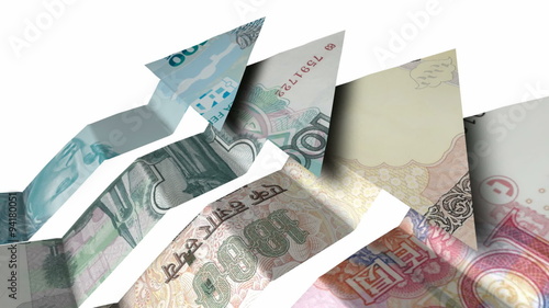 A closeup pan over a group of five arrow shaped notes rising representing the five BRICS nations on an isolated white background photo