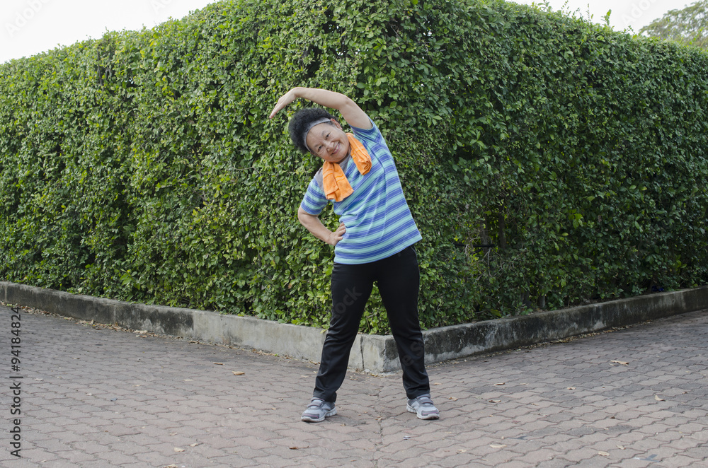 Fototapeta premium Portrait of Asian Elderly Exercise in the park