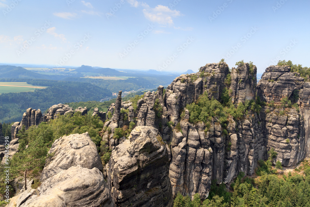 Panorama with Group of rocks Schrammsteine seen from viewing point in Saxon Switzerland Panorama with Group of rocks Schrammsteine seen from viewing point in Saxon Switzerland