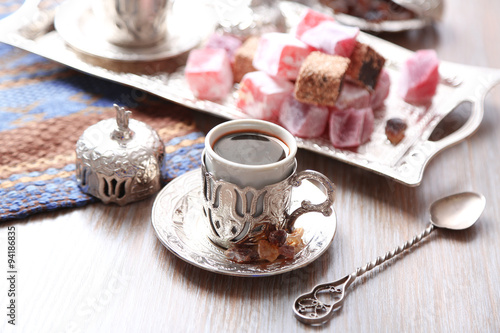 Photos Antique tea-set with Turkish delight on table close-up