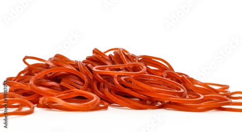 red rubber bands on white background