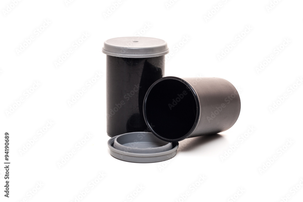 Standard film canister. All on white background Standard film canister. All on white background