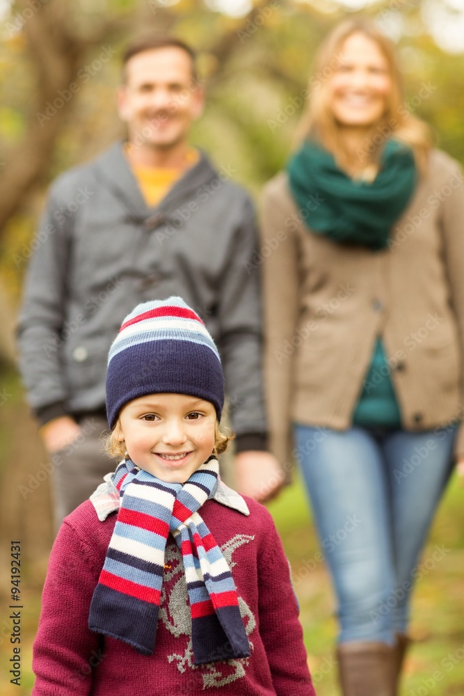 Smiling young family walking together Smiling young family walking together