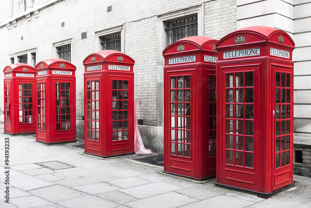 Traditional red telephone boxes in London, UK Traditional red telephone boxes in London, UK