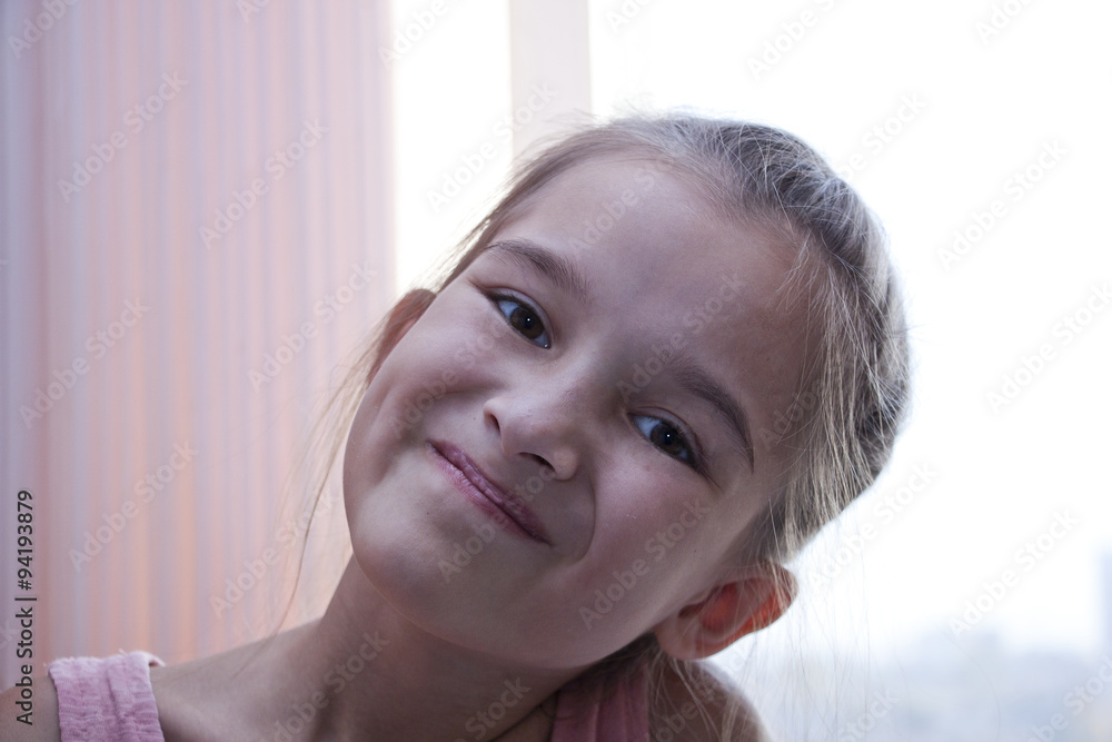 the girl smiles in the morning at the window the girl smiles in the morning at the window