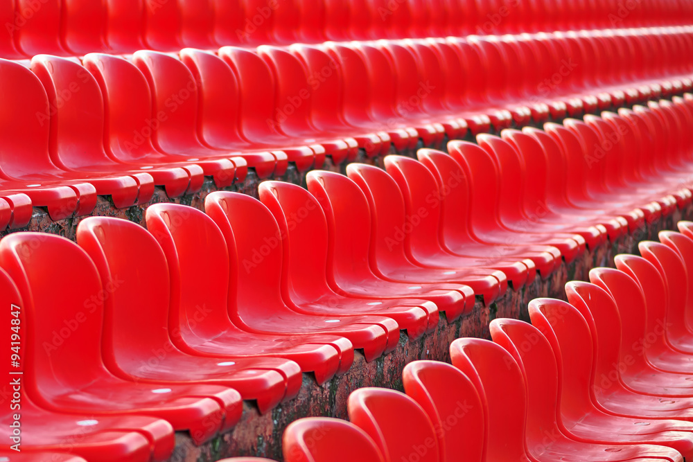 Obraz premium Rows of red empty stadium seats