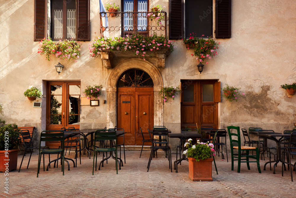 Retro romantic restaurant, cafe in a small Italian town. Vintage Italy