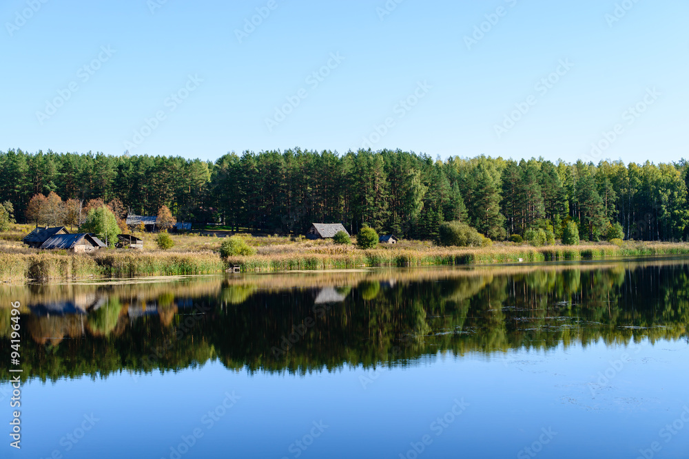 Colorful landscape with a abandoned village on the shore of fore