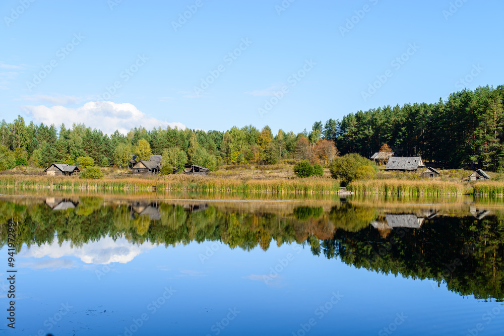 Colorful landscape with a abandoned village on the shore of fore