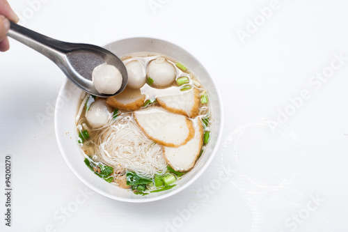 fish noodle in the bowl on the white background 