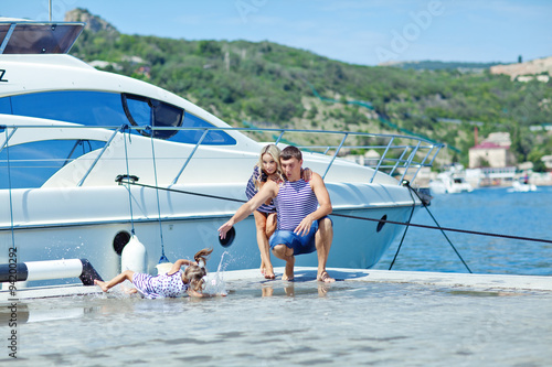 family near the yachts  © nuzza11
