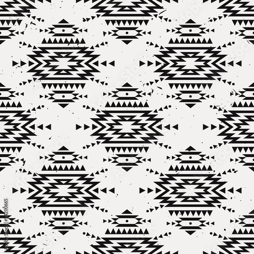 Vector grunge monochrome seamless decorative ethnic pattern. American indian motifs. Background with aztec tribal ornament.