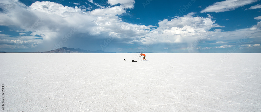 Photographer in the desert, Bonneville salt flats, Utah
