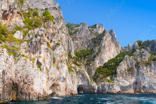 Touristic motorboat enters the grotto of Capri