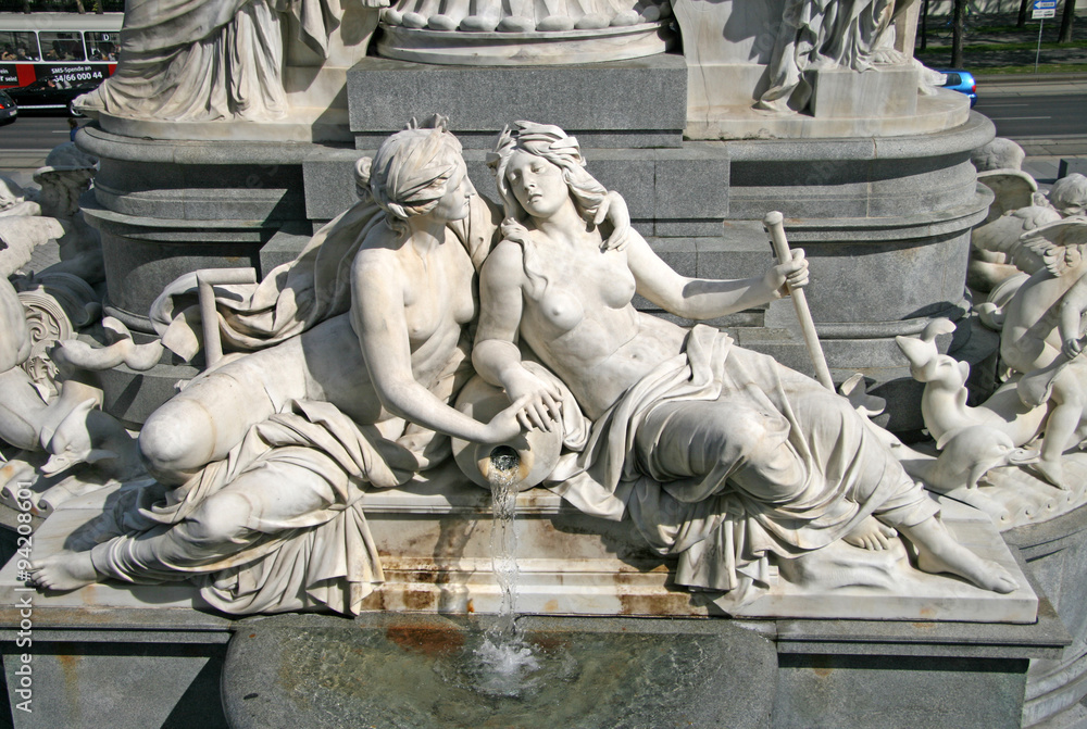 VIENNA, AUSTRIA - APRIL 22, 2010: Statues near Austrian Parliament Building, Vienna, Austria VIENNA, AUSTRIA - APRIL 22, 2010: Statues near Austrian Parliament Building, Vienna, Austria