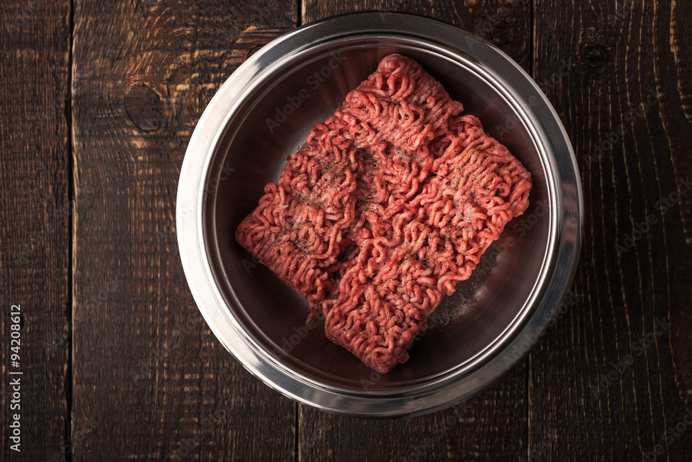 Ground beef with pepper in the metal pan horizontal Ground beef with pepper in the metal pan horizontal