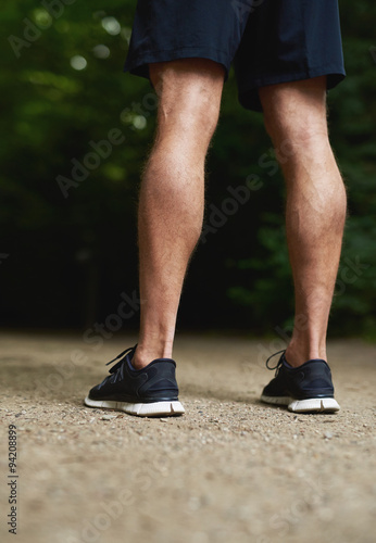 Legs of a fit muscular athletic man