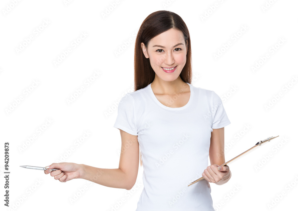 Young Woman hold with clipboard and pen point aside Young Woman hold with clipboard and pen point aside