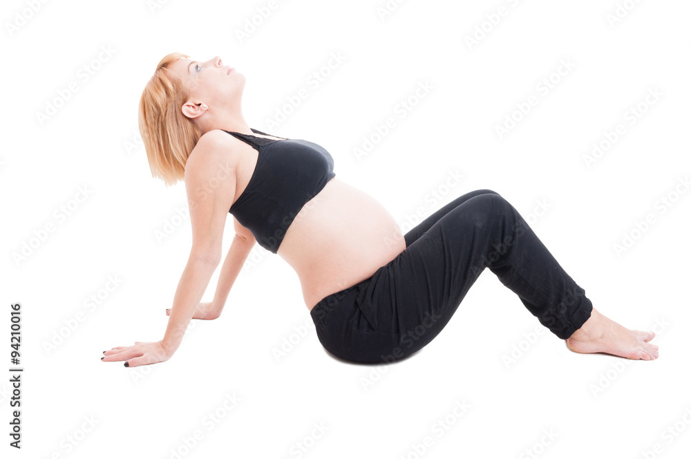 Pregnant woman making prenatal sport exercises Pregnant woman making prenatal sport exercises