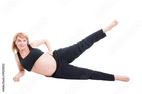 Pregnant woman practicing sport on healthy lifestyle concept
