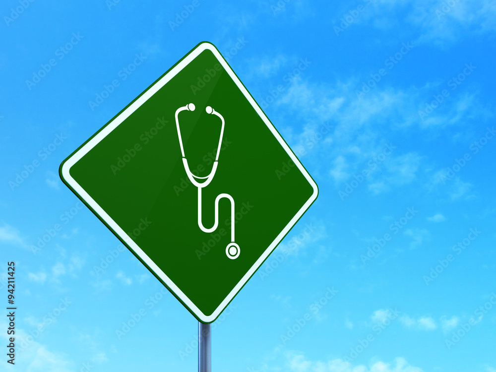 Health concept: Stethoscope on road sign background Health concept: Stethoscope on road sign background