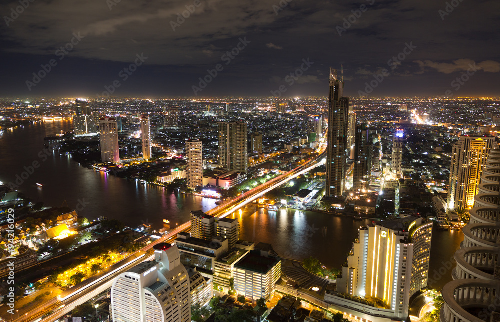 Cityscape of the Bangkok skyline at night in Thailand