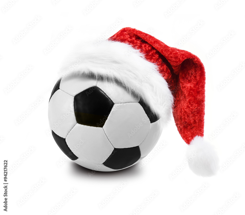 Naklejka premium Fußball mit Nikolausmütze