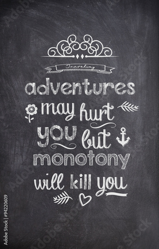 Travel Quote written with chalk on a black board