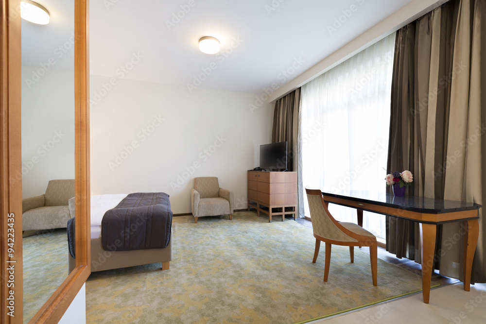 Fototapeta premium Interior of a classic styled apartment with wooden furniture