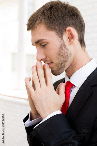 Young handsome man in formal suit