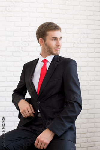 Young handsome man in formal suit