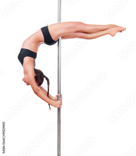 Woman engaged in pole dancing