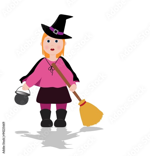 little girl dressed as a witch for halloween