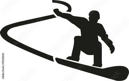 Snowboarder with trace in background