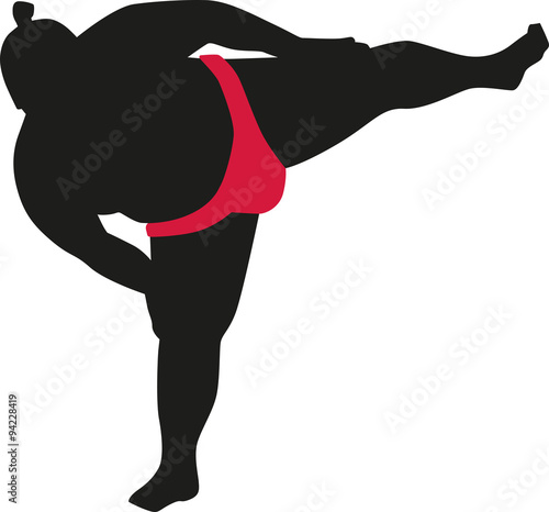 Sumo wrestler standing on one leg