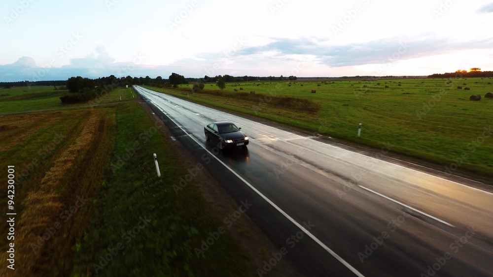 Flight over the cars. Wet road after rain. Aerial footage Flight over the cars. Wet road after rain. Aerial footage
