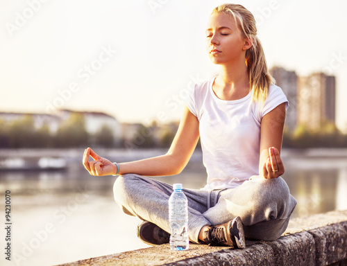 Young girl in yoga pose  photo