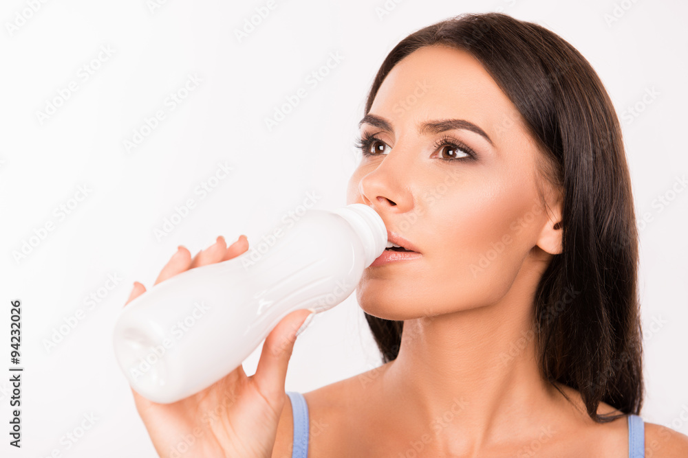 Healthy beautiful young woman drinking yogurt Healthy beautiful young woman drinking yogurt