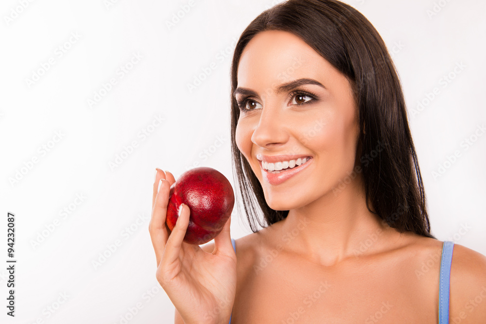 beautiful healthy girl holding a nectarine beautiful healthy girl holding a nectarine