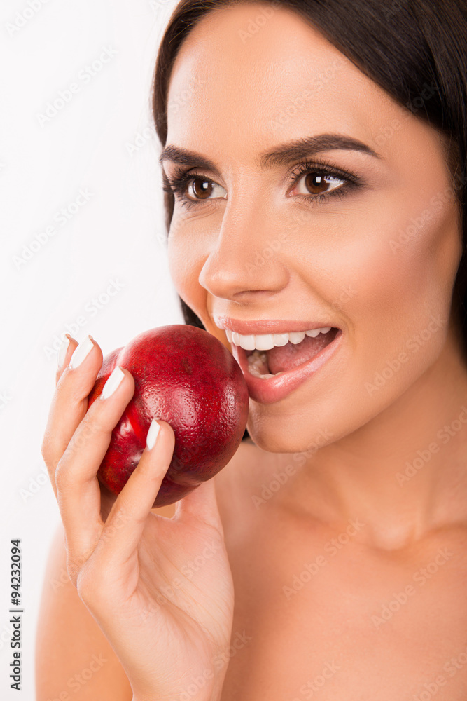beautiful healthy girl biting a nectarine beautiful healthy girl biting a nectarine