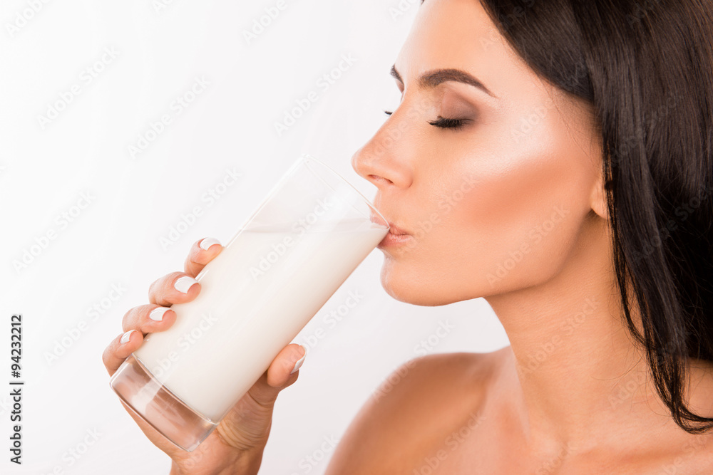 Sexy beautiful young woman drinking milk Stock Photo | Adobe Stock