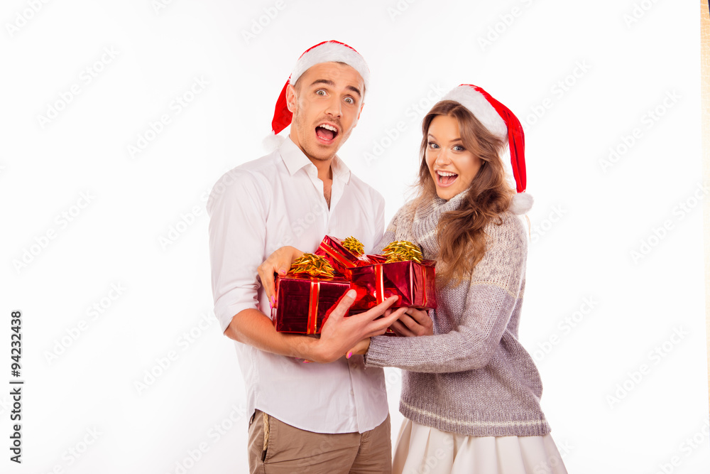 cheerful funny man and woman holding a gifts cheerful funny man and woman holding a gifts