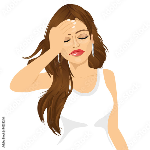 brunette woman touching her head suffering a painful headache