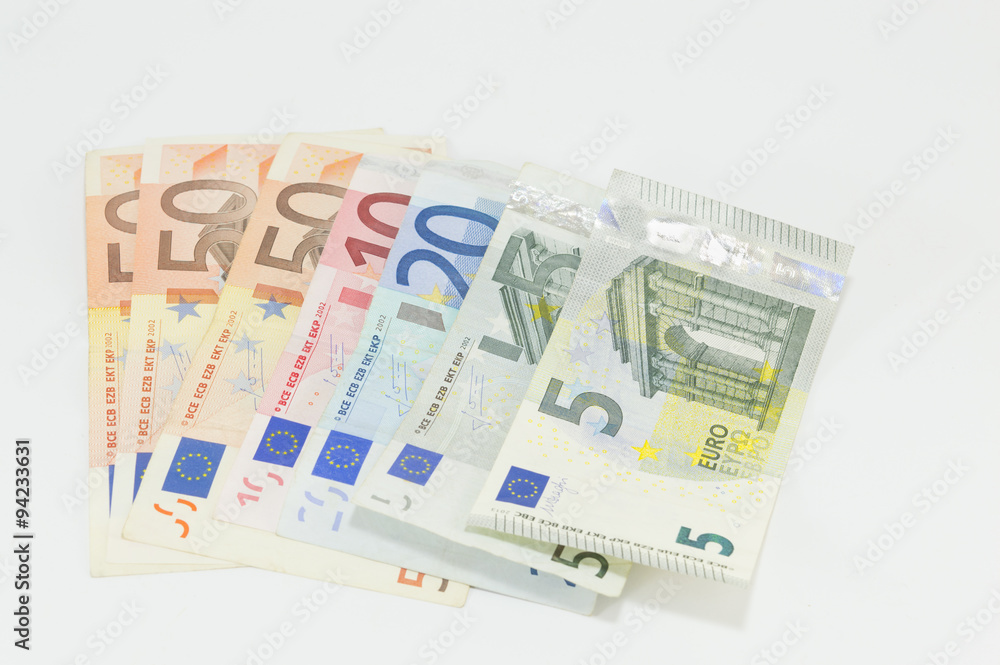 Euro bills placed on white background Euro bills placed on white background
