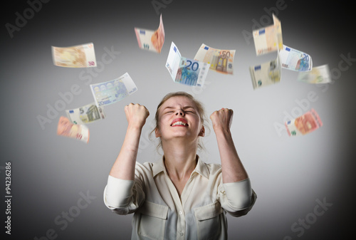 Rejoicing. Girl in white and Euro.