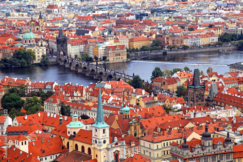 Panorama of Prague Old Town with red roofs and Vltava river
