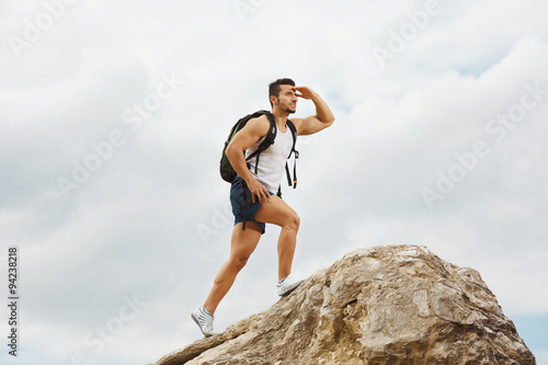 Young man tourist with a backpack