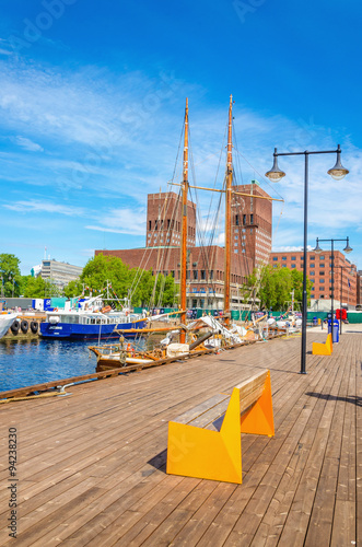 Oslo City Hall and wooden pier of Fjord, Norway